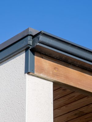 House rain grey gutter waterproofing home corner roof facade